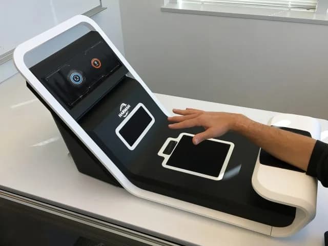 Tabletop mid-air haptics prototype with display showing infotainment applications